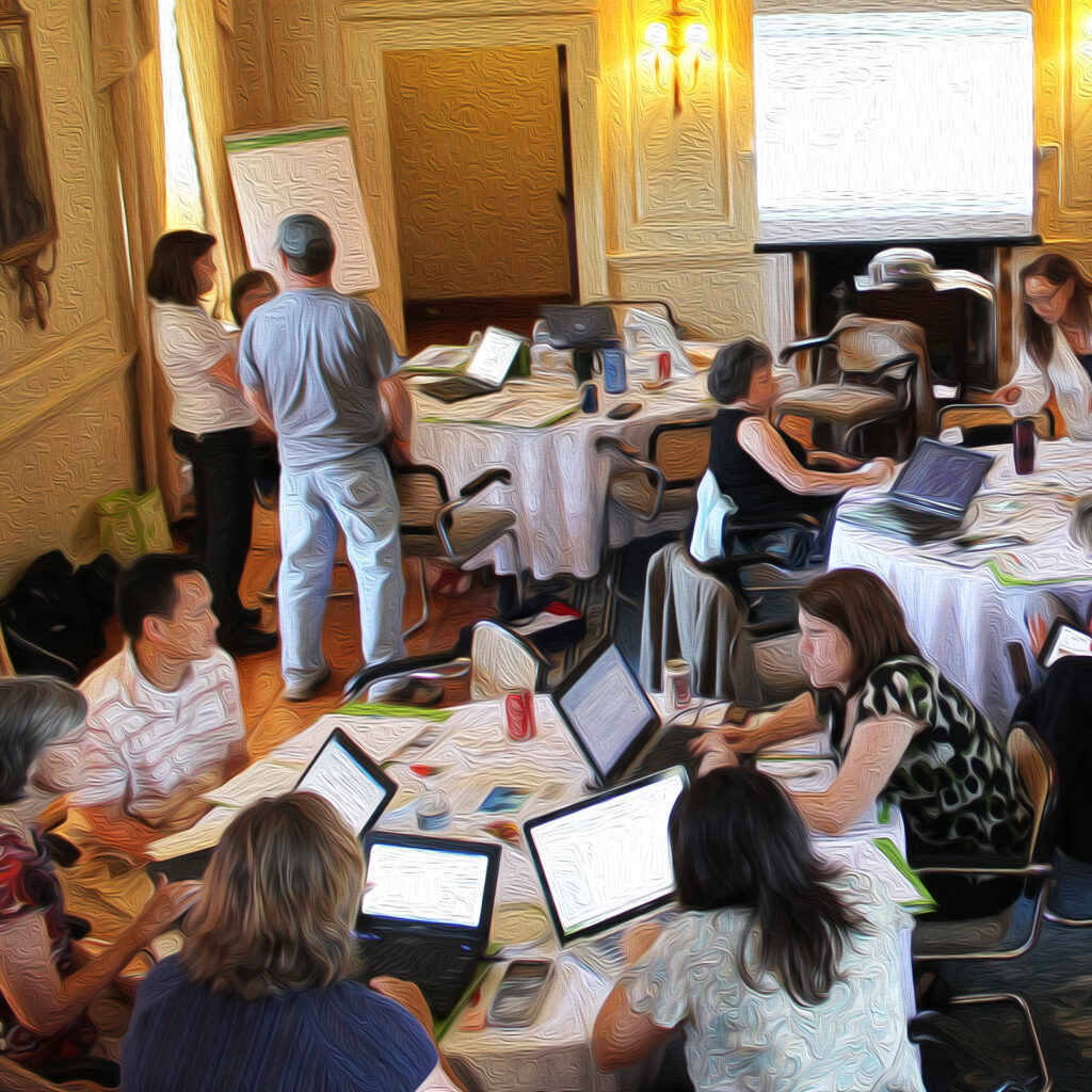 Conference participants working together around tables